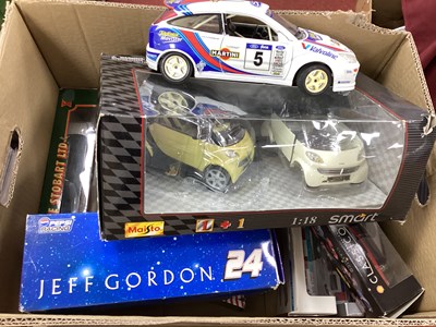 Lot 385 - Sixteen Diecast Model Vehicles by Maisto,...