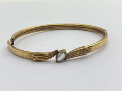 Lot 306 - A Modern Hinged Bangle, with inset highlight,...