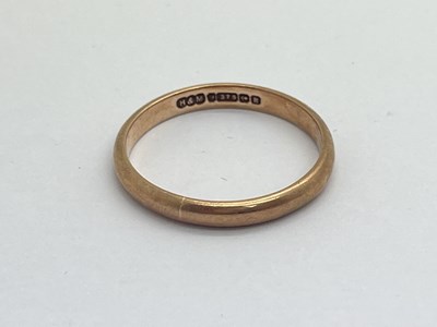 Lot 311 - A 9ct Rose Gold Plain Wedding Band, (finger...