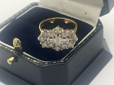 Lot 173 - An 18ct Gold Diamond Cluster Ring, of shaped...