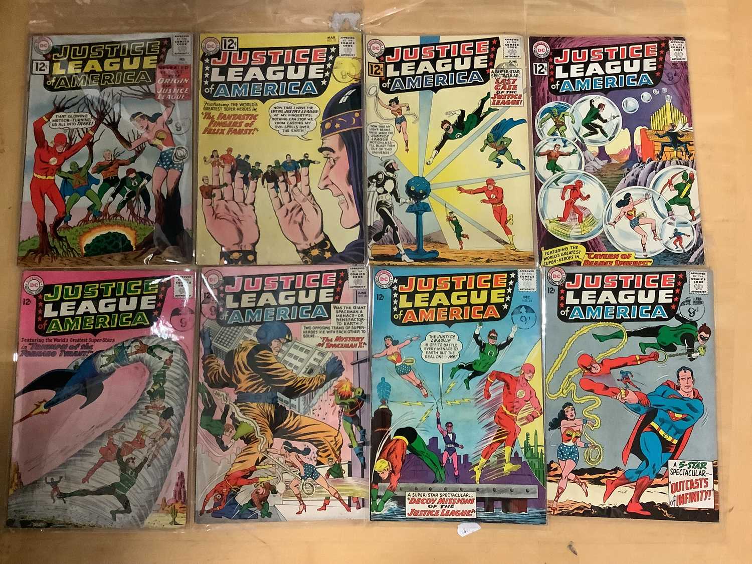 Lot 700 - Eight Justice League of America DC Comics,...