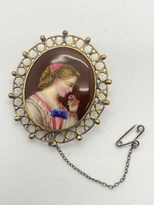 Lot 292 - An Ornate Hand Painted Pottery Brooch, the...