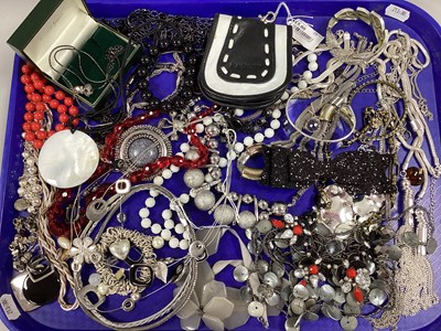 Lot 10 - A Collection of Costume Jewellery, in hues of...