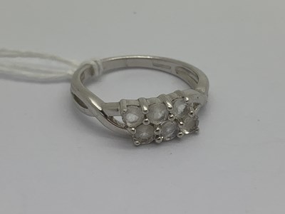 Lot 142 - A 9ct White Gold Moonstone Set Ring, of two...