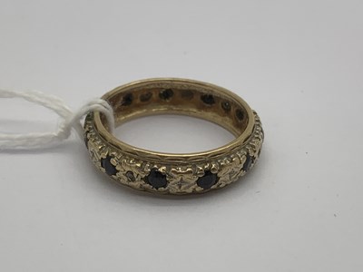 Lot 139 - A 9ct Gold Stone Set Eternity Band, the...