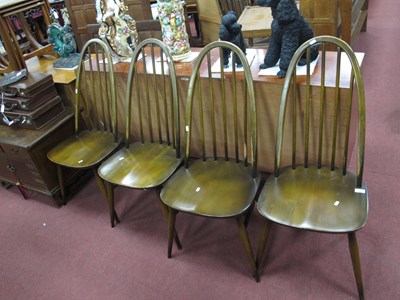 Lot 1622 - Four Ercol Quaker stick back dining chairs...