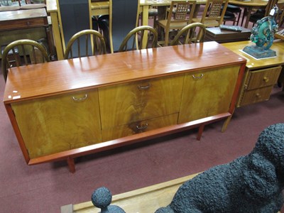 Lot 1623 - A retro teak effect sideboard with cocktail...