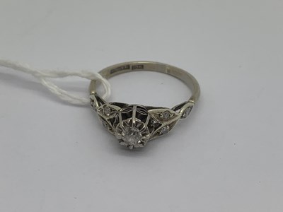 Lot 128 - An Art Deco Style Diamond Ring, the cathedral...