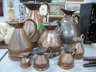 Lot 1462 - XIX Century Graduated Copper Jugs, of conical...