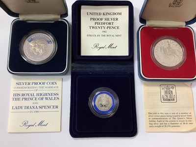 Lot 503 - Three Royal Mint Silver Proof Coins, including...