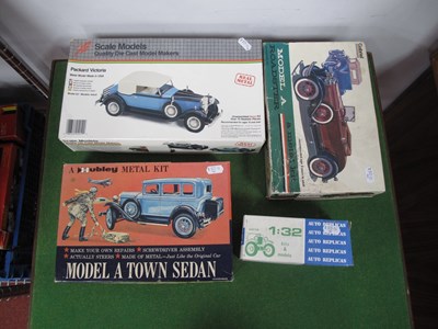 Lot 480 - Four Metal Model Car Kits by Gabriel, Hubley,...