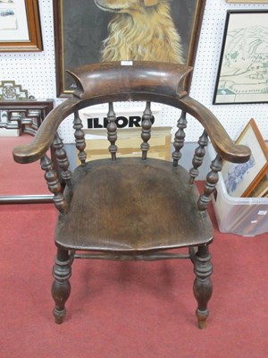 Lot 1550 - A Victorian Smoker's Bow Armchair.