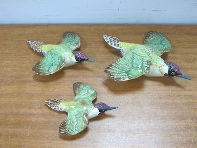 Lot 1224 - Beswick Green Woodpecker Wall Plaques, each...