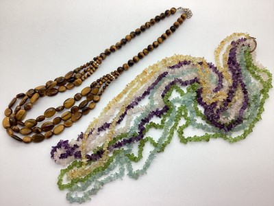 Lot 131 - A Multi-Strand Hardstone Chip Necklace, to...