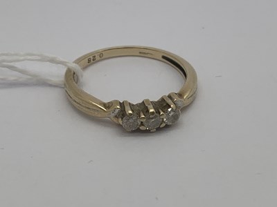 Lot 150 - A 9ct Gold Diamond Three Stone Ring, the claw...