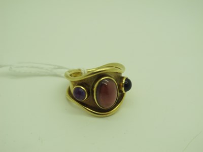 Lot 164 - A Byzantine Style Amethyst and Garnet Three...