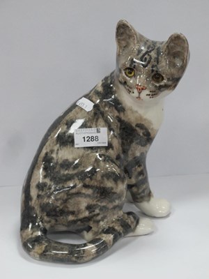 Lot 1288 - Winstanley Seated Grey Tabby Cat, glass eyes,...