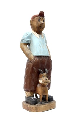 Lot 1482 - A Carved Wooden Figure of Tintin with Snowy,...