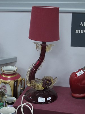 Lot 1213 - A Murano Ruby Glass Dolphin Table Lamp, with...