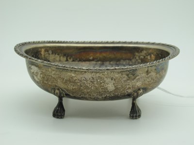 Lot 81 - An Oval Dish, with twisted edge and planished...