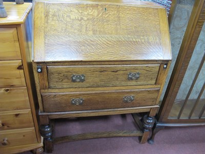 Lot 1588 - 1930's Oak Bureau, with a fall front, two long...