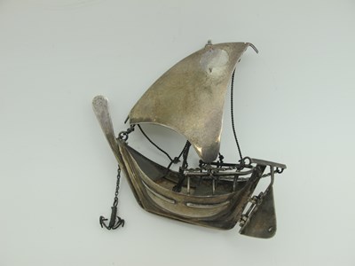 Lot 66 - A Novelty Model Ship, with articulated rudder,...