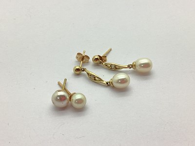 Lot 186 - A Pair of Modern Single Pearl Drop Earrings,...