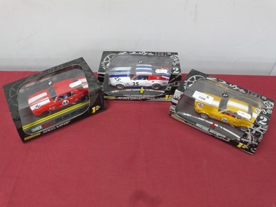 Lot 709 - Three 1:32 Scale Slot Cars by Pioneer to...