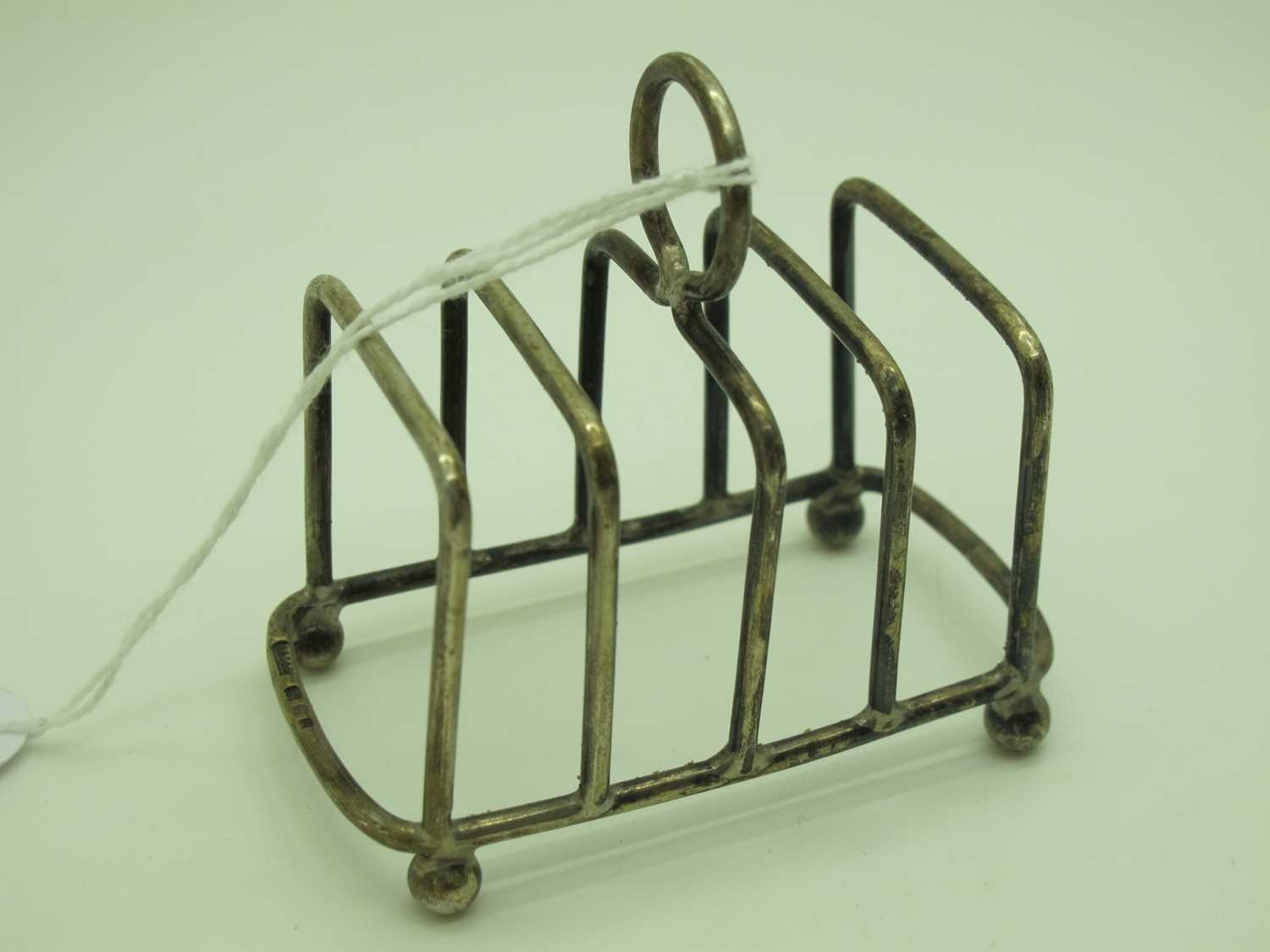 lot-99-a-small-hallmarked-siver-five-bar-toast-rack
