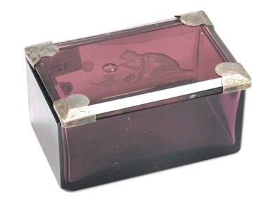 Lot 1256 - An Amethyst Glass Trinket Box, with intaglio...