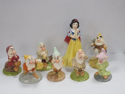 Lot 1335 - Doulton Snow White and Seven Dwarfs, (sleepy...