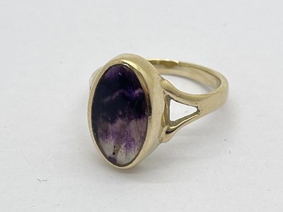 Lot 168 - A 9ct Gold Blue John Ring, the oval panel...