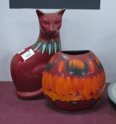 Lot 1212 - Poole Pottery Flambe Cat, 29cm high and oval...