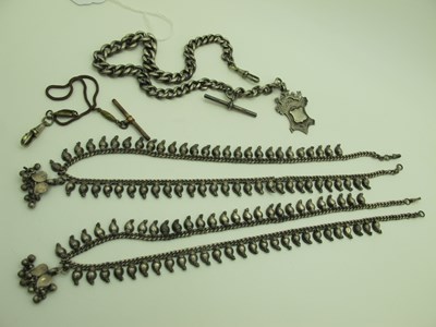 Lot 112 - A Graduated Curb Link Albert Chain, suspending...