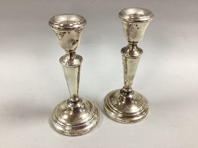 Lot 125 - A Pair of Hallmarked Silver Candlesticks,...