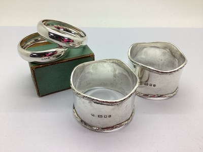 Lot 137 - A Pair of Slim Hallmarked Silver Napkin Rings,...