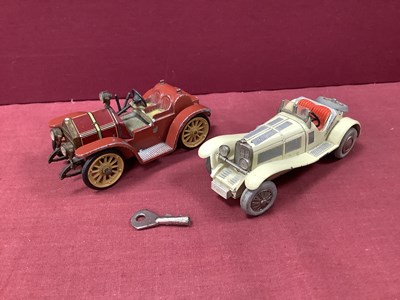 Lot 727 - Two Post War Clockwork Diecast Micro Racer...