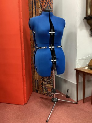 Lot 1628 - An adjustable dress form dummy on metal stand.