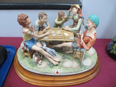 Lot 1211 - A Large Capodimonte Figurine Group of Boys...