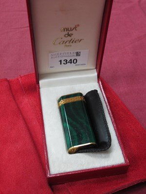 Lot 1340 - Cartier; A malachite type cigarette lighter,...