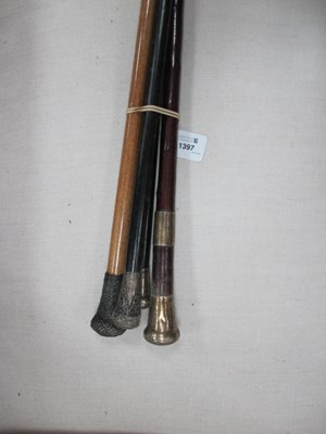 Lot 1397 - Three Hallmarked Silver Topper Canes; another...