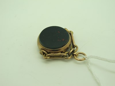 Lot 104 - A 9ct Gold Hardstone Inset Swivel Fob Pendant.