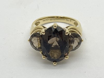 Lot 88 - A 9ct Gold Stone Set Cocktail Ring, oval set...