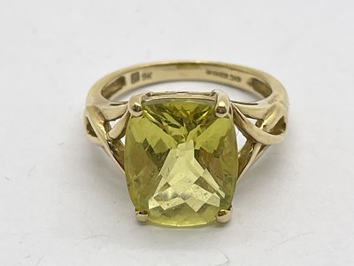 Lot 80 - A 9ct Gold Stone Set Dress Ring, faceted...