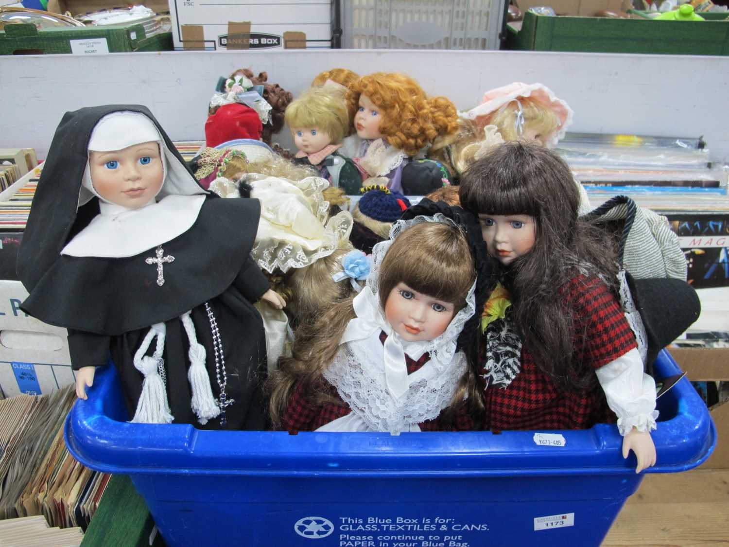 Lot 1173 - A large collection of porcelain dolls to...