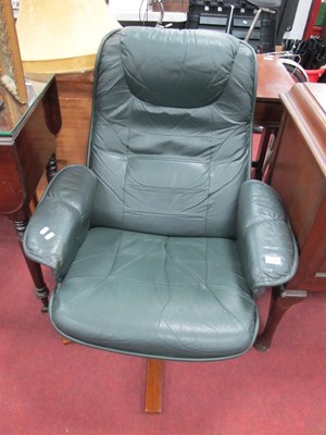 Lot 1596 - Stressless Style Green Leather Armchair, on a...