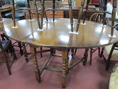 Lot 1601 - XX Century Oak Gate Leg Table, on turned and...