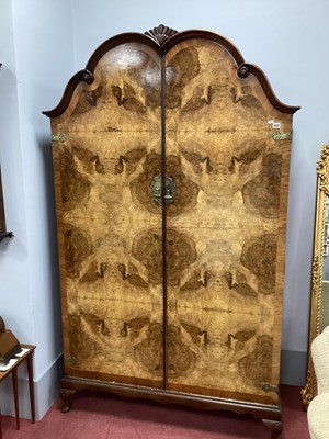 Lot 1632 - XX Century Walnut Wardrobe, with a shaped...