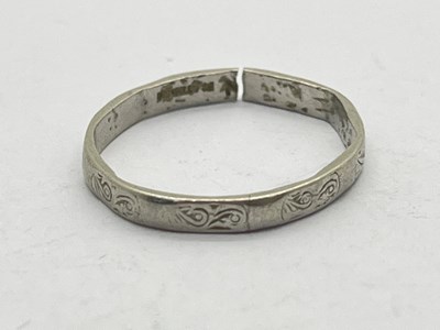 Lot 85 - A Dainty Decorative Band, (damages), scrolling...