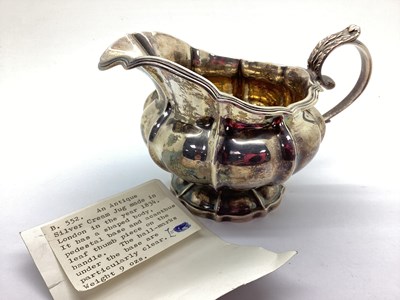 Lot 29 - A Georgian Hallmarked Silver Jug, WE, London...